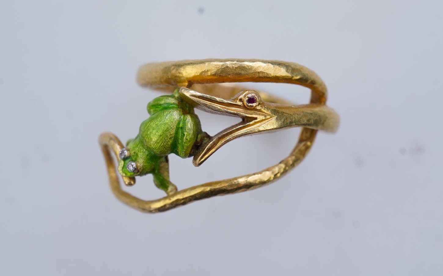 An unusual gold and enamel novelty ring